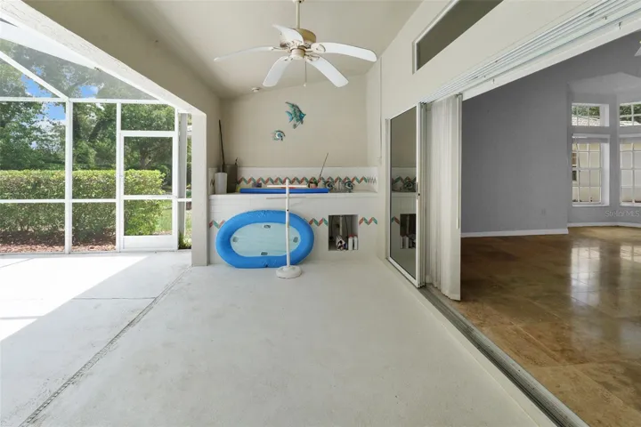 Lanai with sliders open to living area