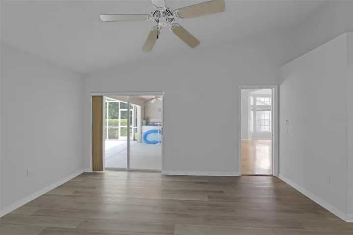 Main bedroom w/sliders to the pool
