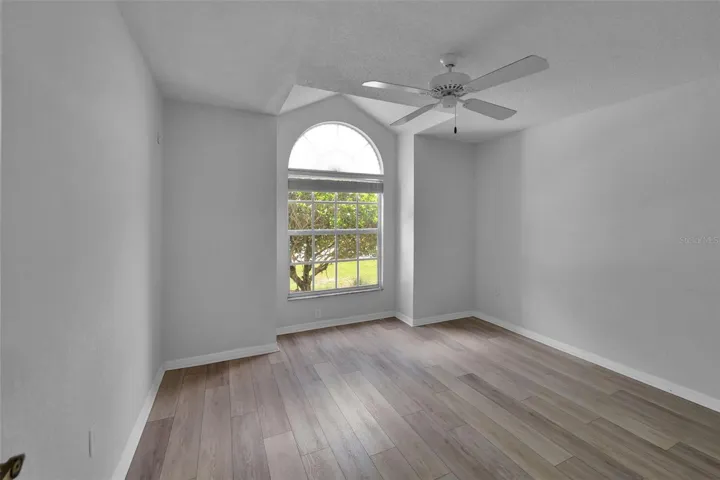 Bedroom 1 looks to front yard, built in closet