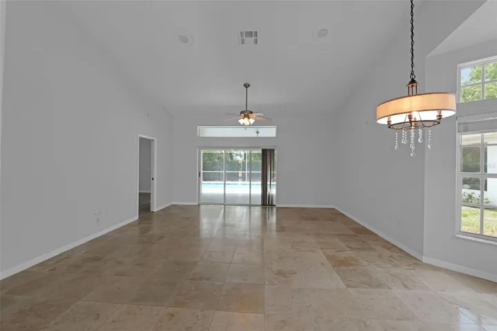 Dining & living room combo. Sliders open all the way for a great breeze and open feel.