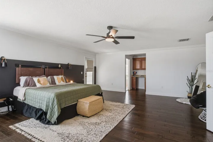 Very Large Primary Suite and oversized walk in closet with working desk area.