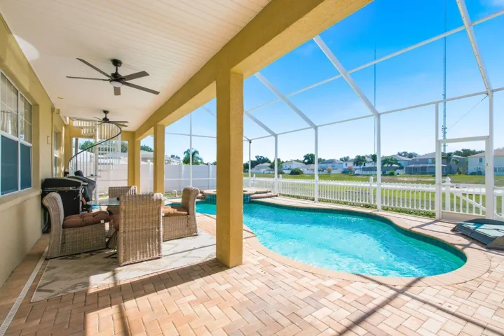 Extended rear covered porch with Pool and Spa