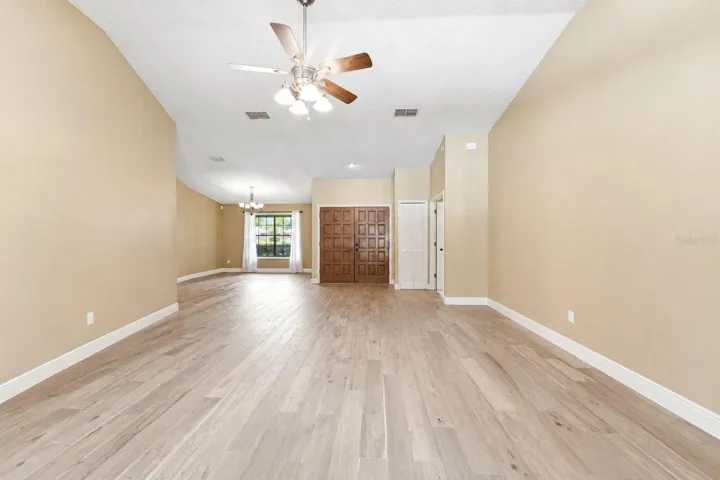 Living room with Dining room in background