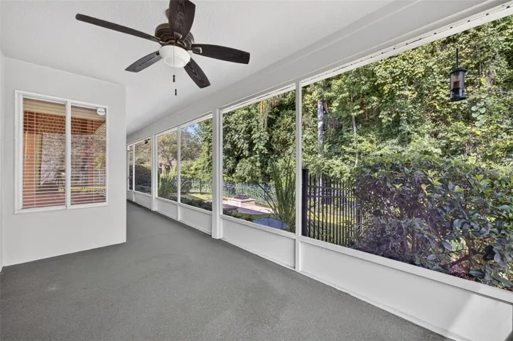 Enclosed porch entrance off primary suite