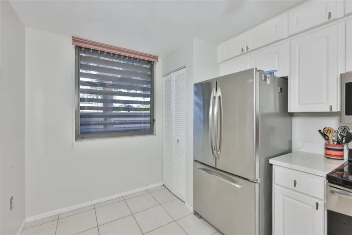 Kitchen showing front window to the courtyard
