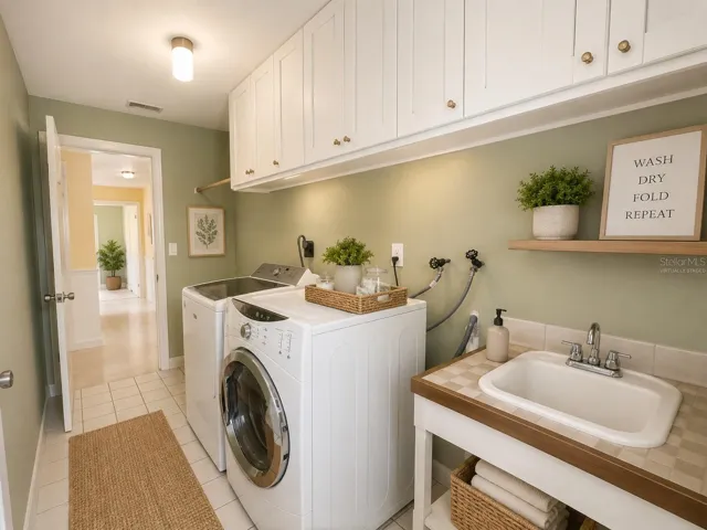VIRTUALLY STAGED - Laundry looking toward hallway