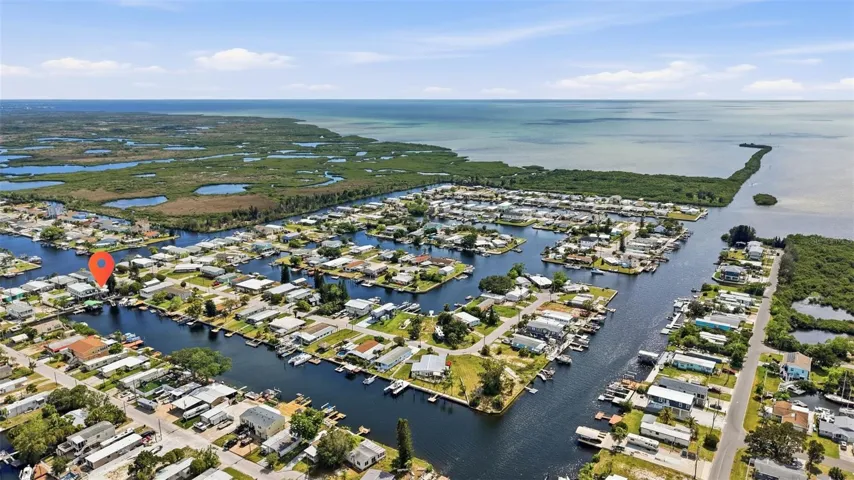 Just check this out.....you are only minutes from the Mouth of the Gulf.  You can also see Redneck Island in this photo just at the beginning of the opening to the Gulf on the right.  This is a local legendary sandbar that people love to hang out at with kids, pets, you name it this place is so much fun!!
