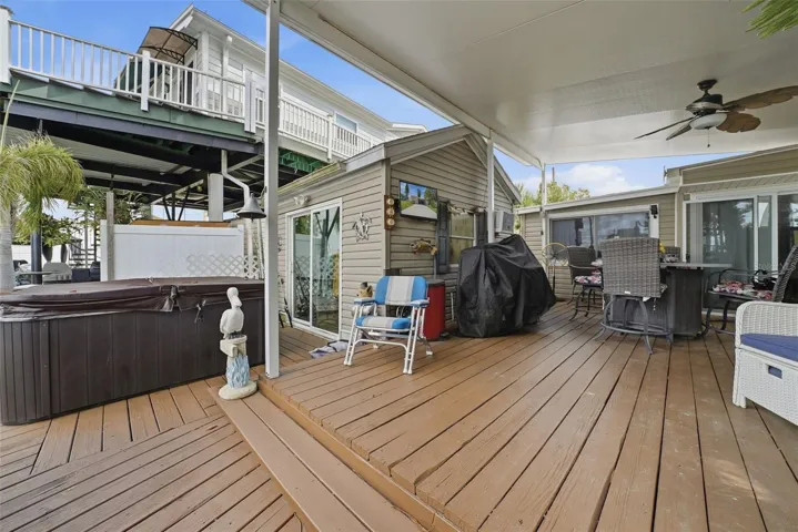 Lets step back outside and look at this man cave/studio/workshopwith sliding patio doors overlooking the amazing saltwater canal!!