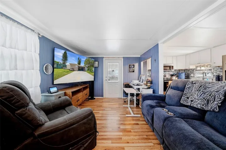 Living room and kitchen make it easy to cook and entertain without missing a thing!