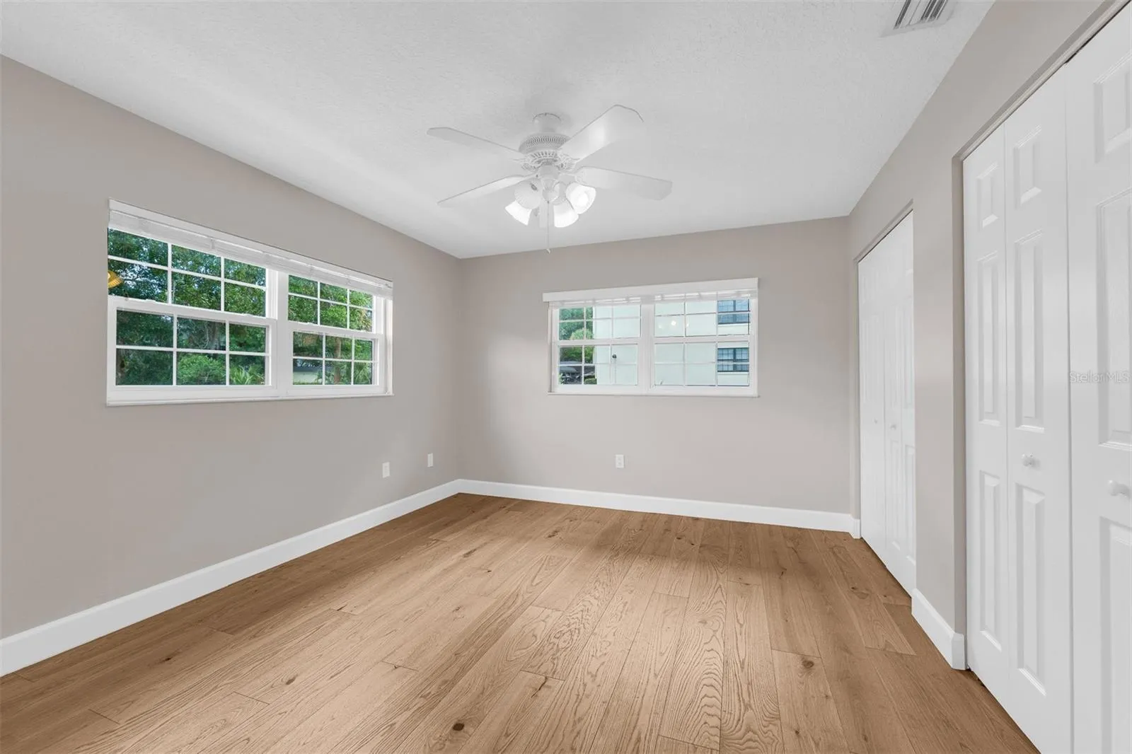 2nd Bedroom.  Double closet and lots of natural light