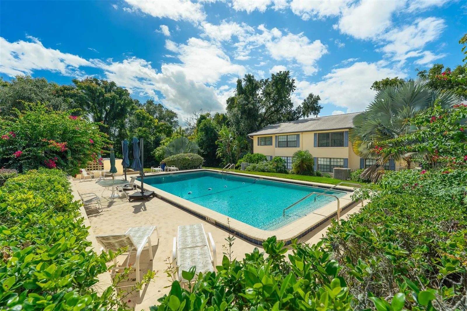 Lush Landscaping throughout the property and lovely pool area