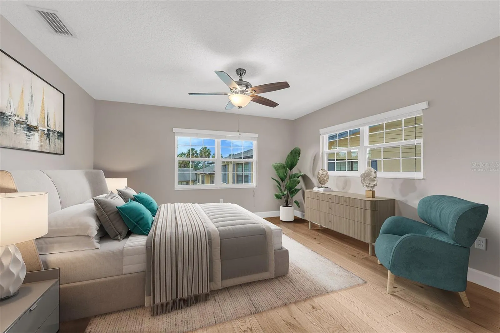 Primary Suite. Corner unit provides tons of natural light. Virtually Staged.