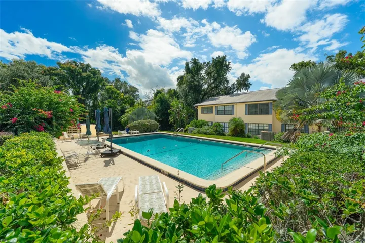 Lush Landscaping throughout the property and lovely pool area