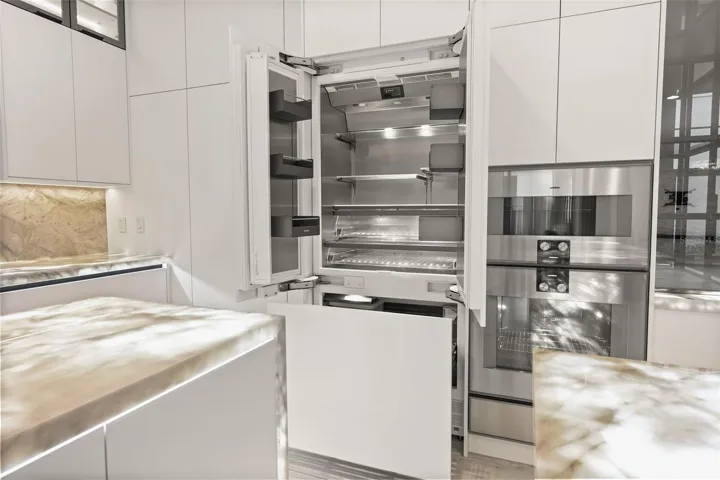 Gourmet kitchen complete with Gaggenau appliances and built-in nugget ice machine