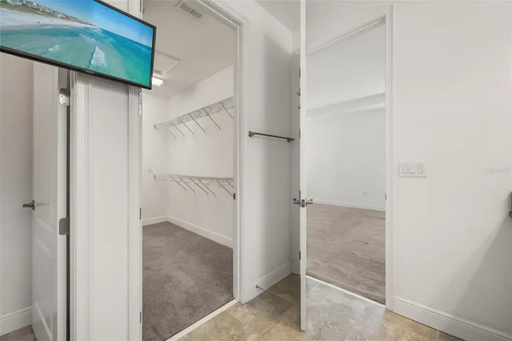 Primary bathroom with access to primary closet