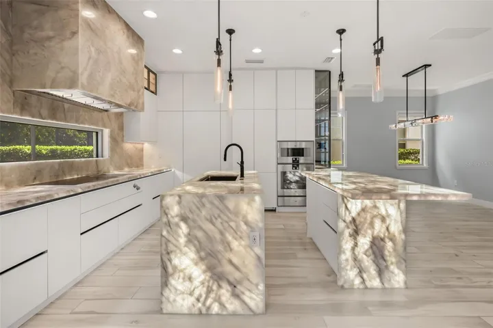 Gourmet kitchen complete with Gaggenau appliances and built-in nugget ice machine