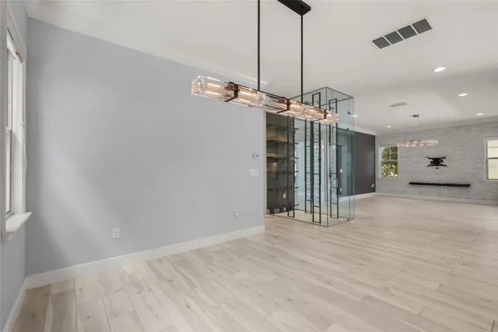 Dining room with Restoration Hardware lighting
