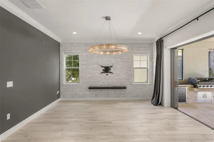 Living room with Restoration Hardware chandalier