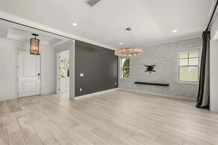 Family room with Restoration Hardware chandalier