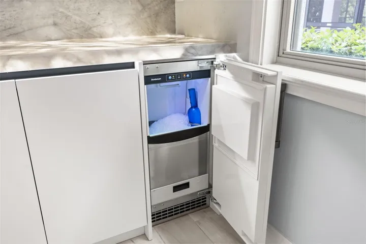 Gourmet kitchen complete with Gaggenau appliances and built-in nugget ice machine