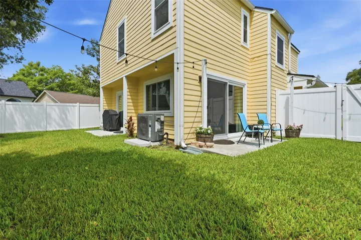 BACK OF THE HOUSE AND YARD