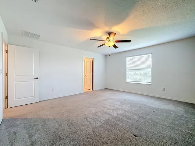 upstairs primary bedroom suite