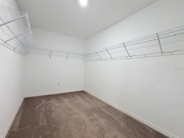 upstairs primary en-suite walk-in closet