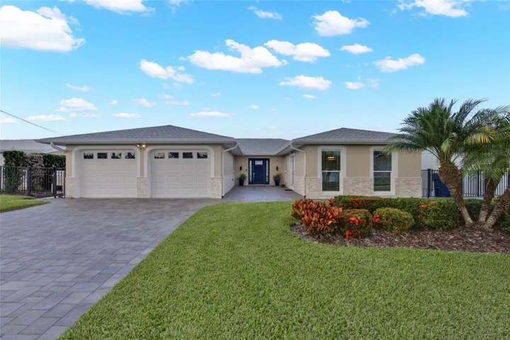 WELL MAINTAINED YARD - UPDATED SOD.  PAVED FRONT DRIVE. NEW WINDOWS.  FENCED PROPERTY