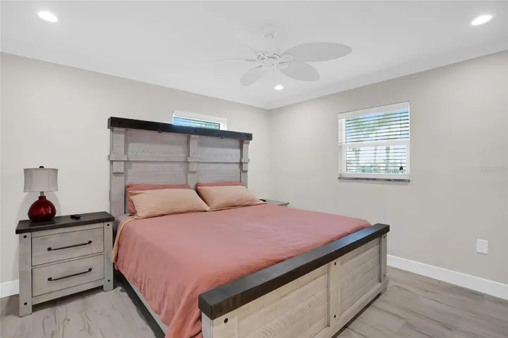 KING SIZE PRIMARY.   PORCELAIN TILES THROUGH OUT ENTIRE HOME - UPDATED WINDOWS + BLINDS