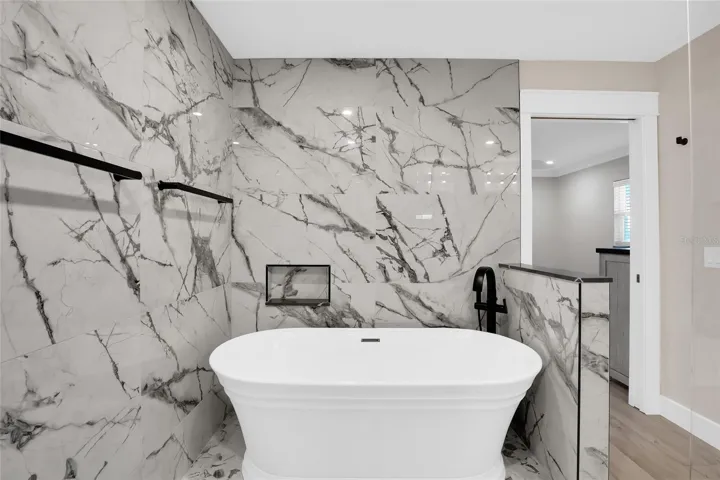 SHOWER AND TUB IN THE PRIMARY BATH