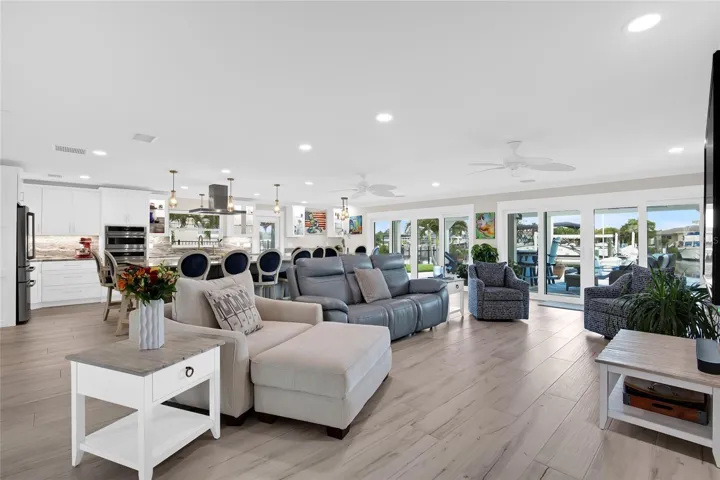 GRAND GREAT ROOM IDEAL FOR ENTERTAINING - LEADS TO THE DOUBLE ENTRY BACK YARD SPACES.  MULTIPLE SPACES IN THE BACK YARD FOR ENTERTAINING AND ENJOYING - SUNSET VIEW FROM FRONT DOOR