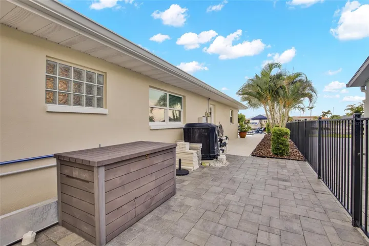 AMPLE STORAGE.  PAVED SIDE AREA - POOL HEATER IS NEW + NEW POOL FILTER.  ROYAL PALMS AND MAJESTIC PALMS FOR RESORT STYLE LIVING