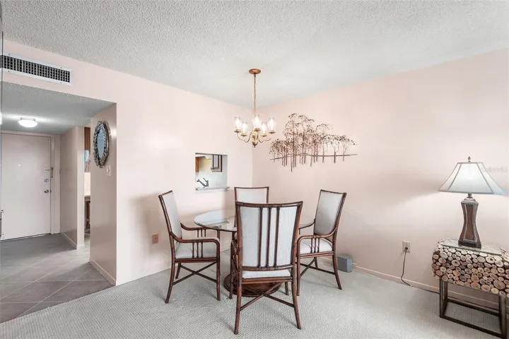 DINING WITH A PASS-THROUGH TO THE KITCHEN