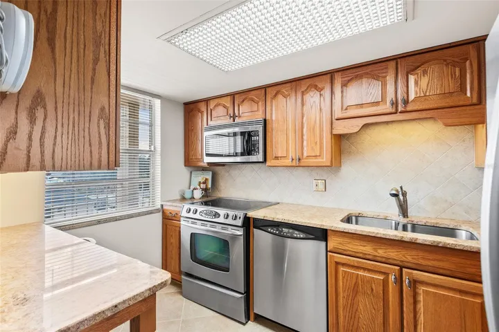 KITCHEN W/WOOD CABINETS