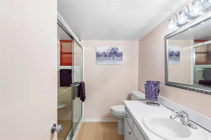 PRIMARY BATHROOM/WALK-IN SHOWER & LINEN CLOSET