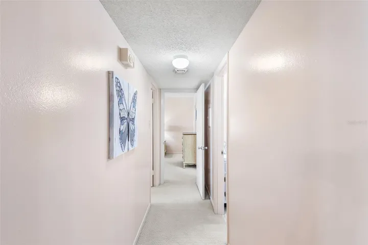 HALL TO PRIMARY BEDROOM