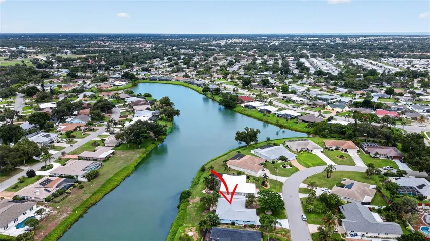 1226 Pine Needle located on a lake in Pinebrook South