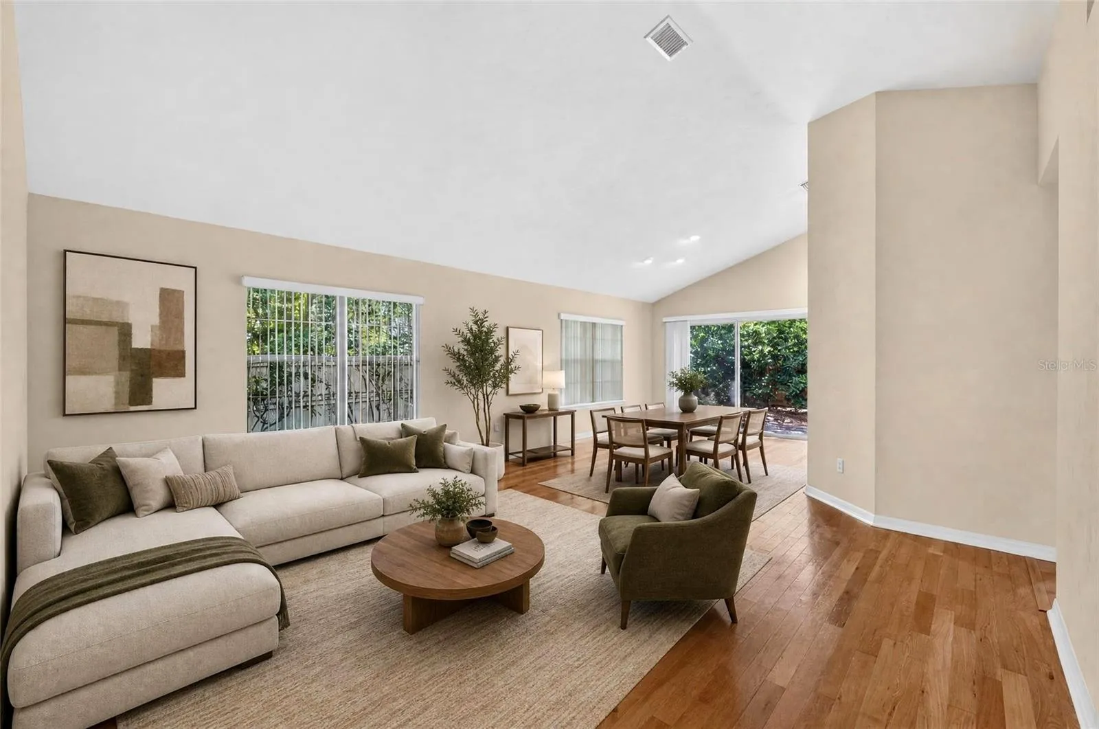 STAGED GREAT ROOM AND DINING AREA