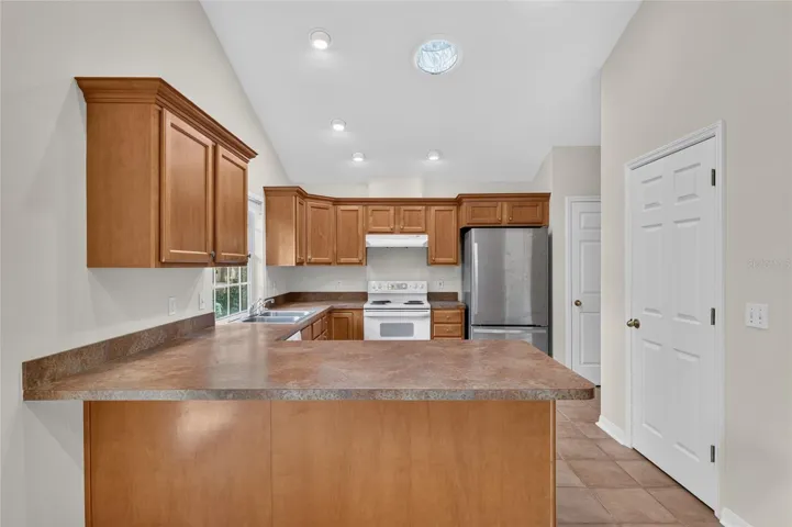KITCHEN WITH WOOD CABINETS