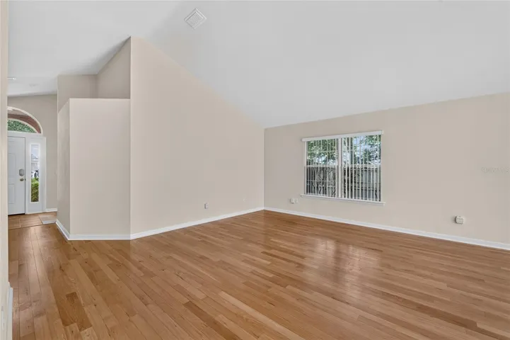 LOOKING BACK TO FOYER FROM GREAT ROOM