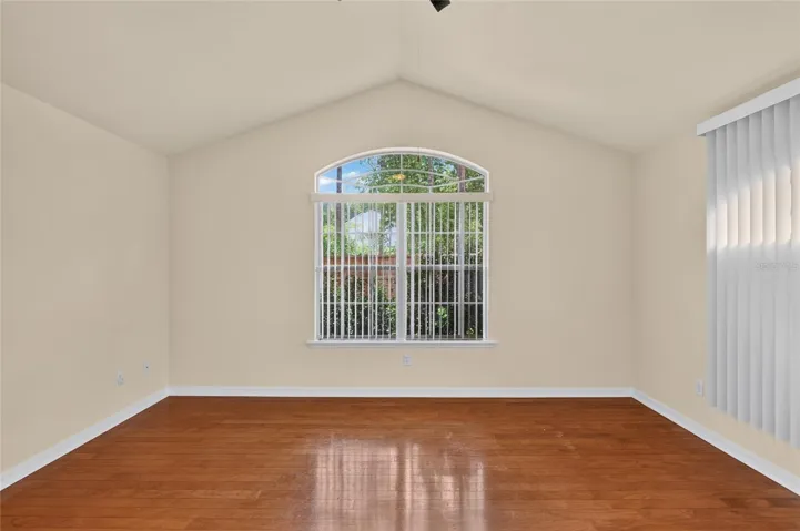 PRIMARY BEDROOM HAS VAULTED CEILINGS