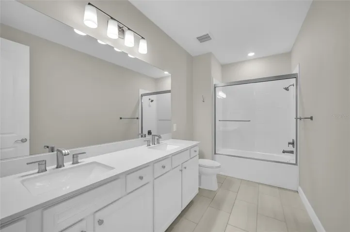 Bathroom Shared by Bedroom 1 and 2.
