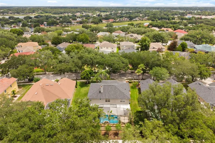 Aerial view of the property and the community