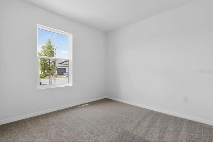 Bedroom 2-Photo description represents the model home of same floor plan.