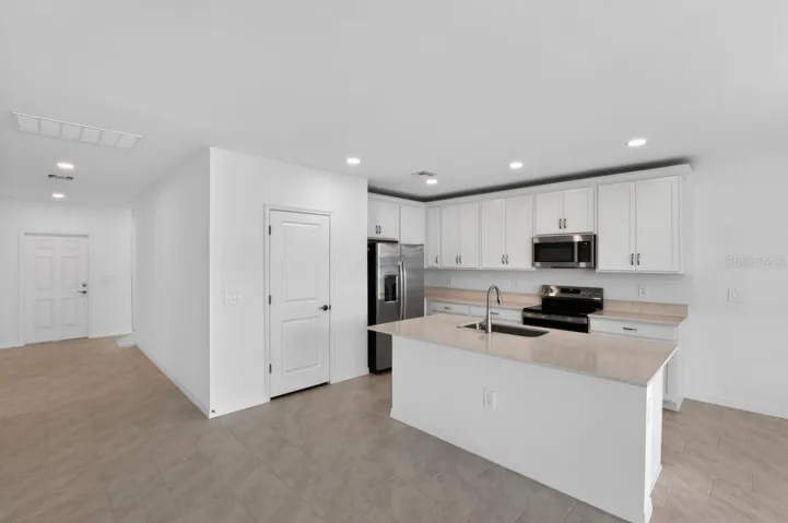 Kitchen-Photo description represents the model home of same floor plan.