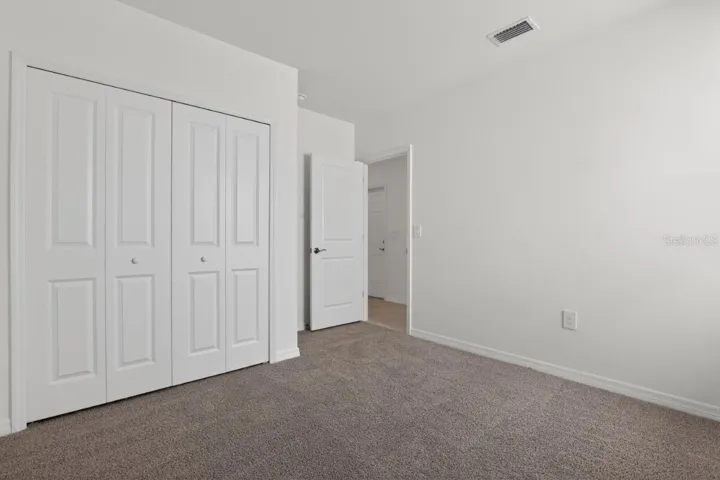 Bedroom 2-Photo description represents the model home of same floor plan.