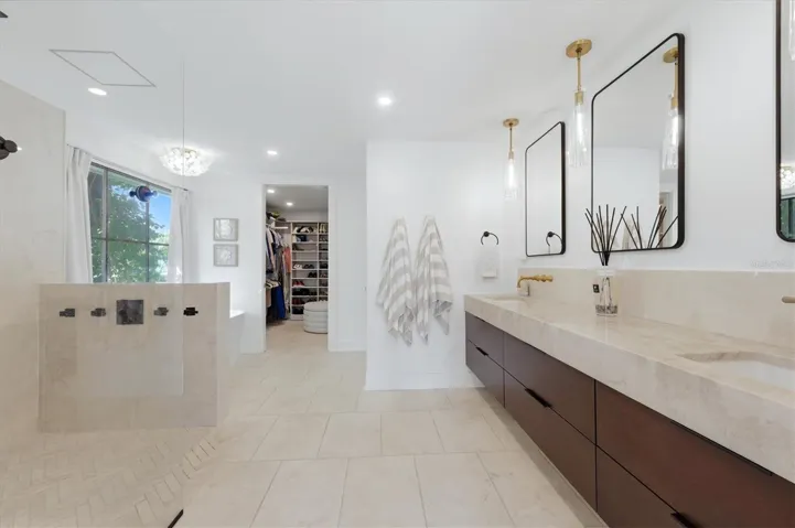 Primary Bathroom with soaking tub, dual sinks, walk in shower