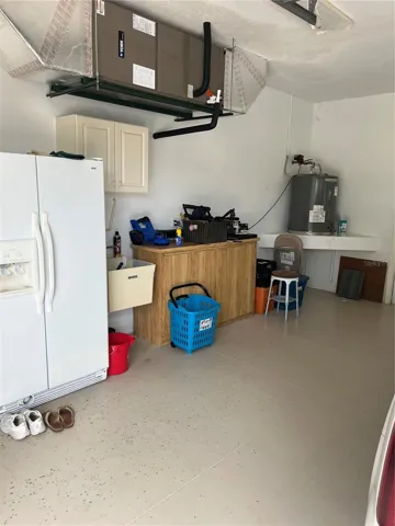 Extra wide garage with this additional storage space.