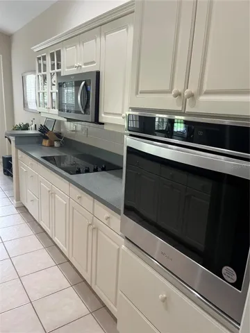 Wall built-In oven and cook top with micro-vent.
