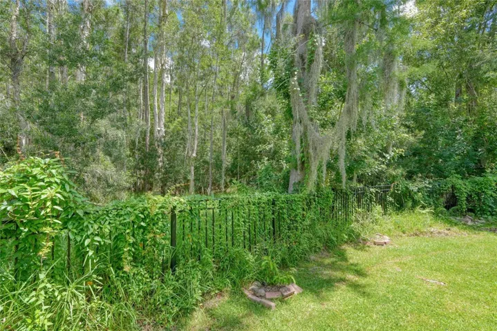 Peaceful wooded backdrop with no rear neighbors
